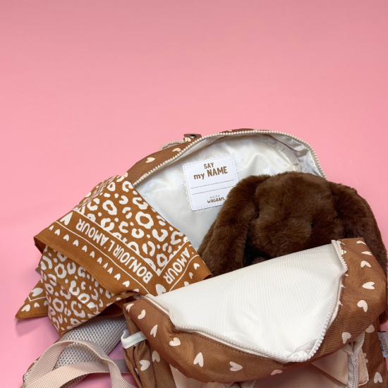 Sac à dos - cœurs beiges / fond marron
